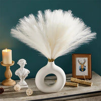 “Bouquet herbe de pampa artificielle blanche 55 cm déco boho chic maison et mariage”
“Pampas artificielles blanches fluffy sans entretien pour vase”